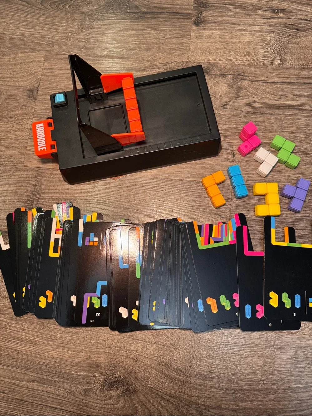 Kanoodle Compact Brain Teaser Game with Colorful Puzzle Pieces